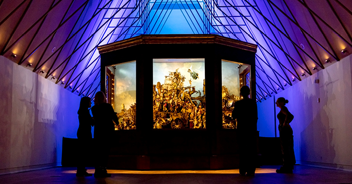 group of people admiring the nativity scene at The Auckland Project